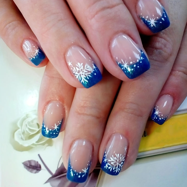 Glittering artificial nails in winter snowflake design Stornfield