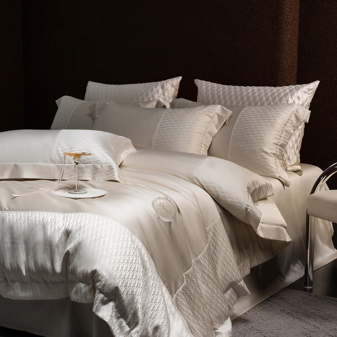 Luxurious satin bedding set with jacquard trim and embroidered coat of arms