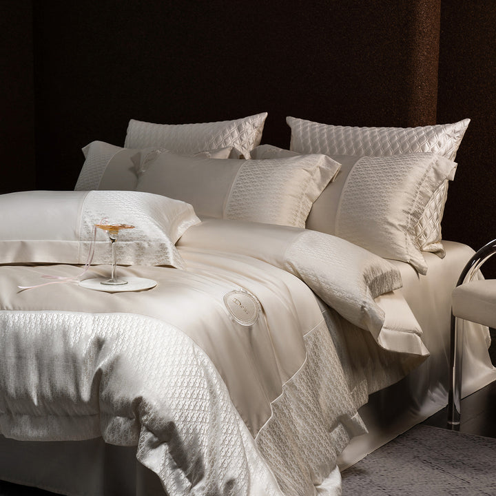 Luxurious satin bedding set with jacquard trim and embroidered coat of arms