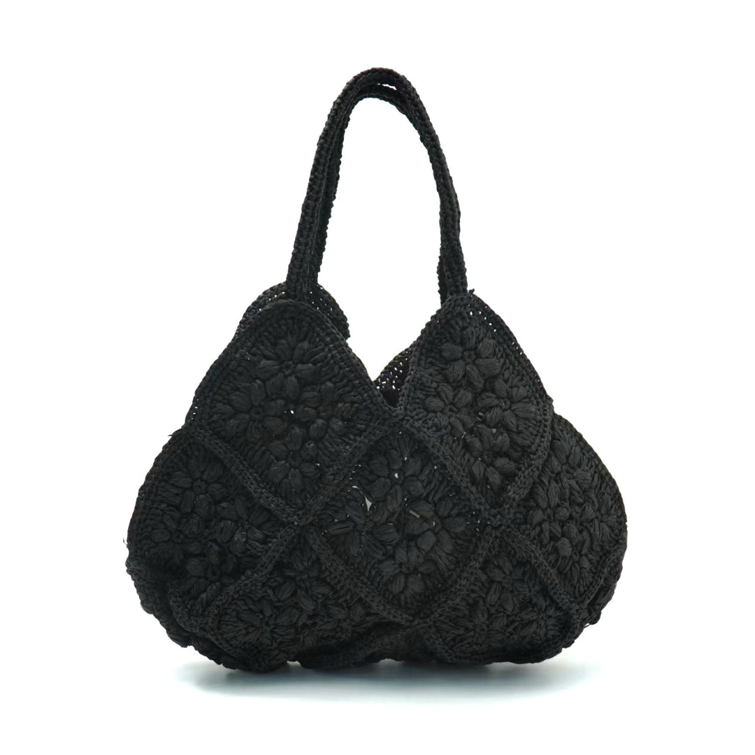 Handmade macrame shoulder bag with playful flower pattern Stornfield