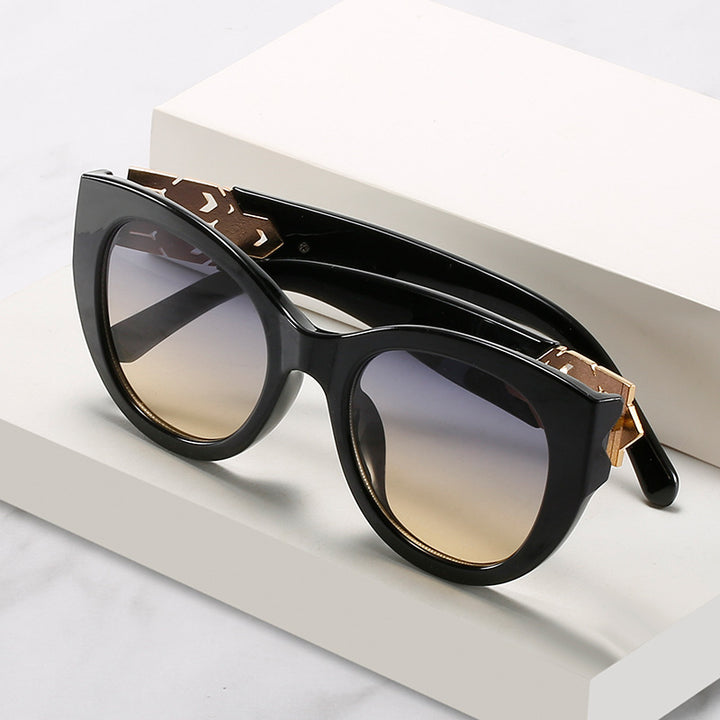 Fashion-Forward Cat-Eye Sunglasses with Decorative Accents Stornfield