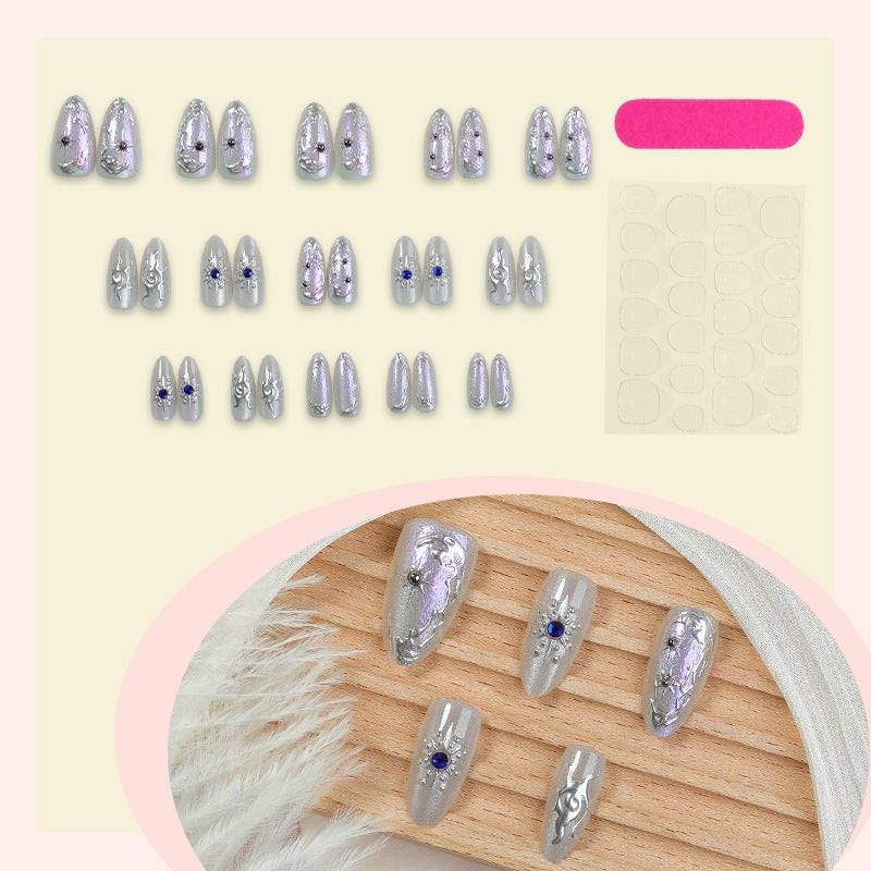 Artificial nail set with shiny metallic effect and elegant decorations Stornfield