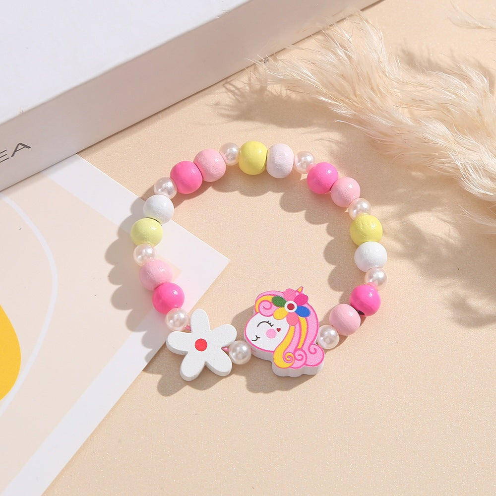 Playful children's bracelet with unicorn and flower motif Stornfield