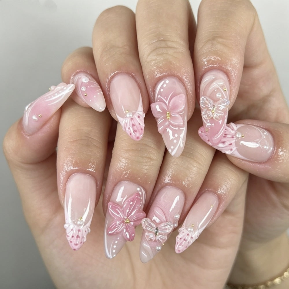 Artificial nails with romantic flower and butterfly accents Stornfield