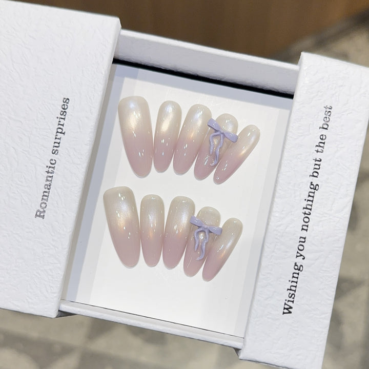 Artificial nails with romantic design and shimmering accents Stornfield