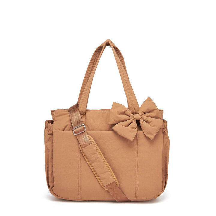Fashionable tote bag with elegant bow appliqué Stornfield