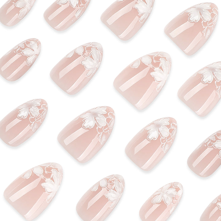 Artistic stiletto nails with floral embellishments Stornfield