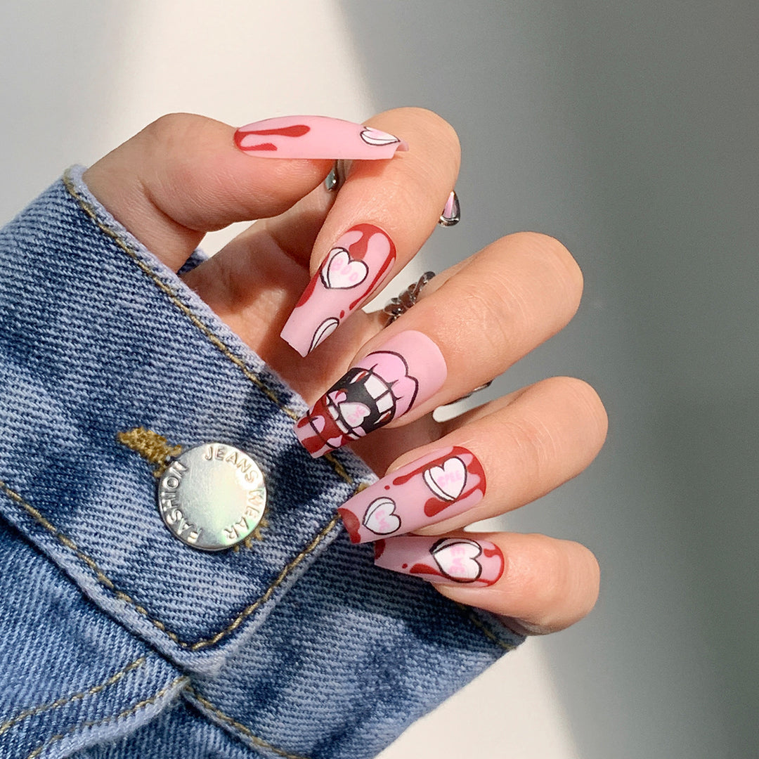 Artificial nail art with heart-shaped design and matte finish Stornfield