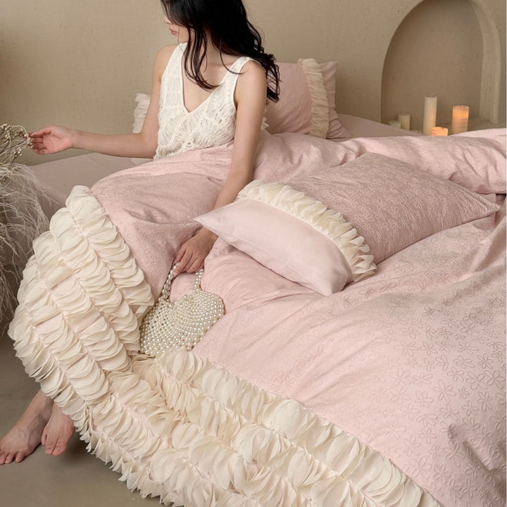 Romantic ruffle bedding set with layered frill and quilted bedspread