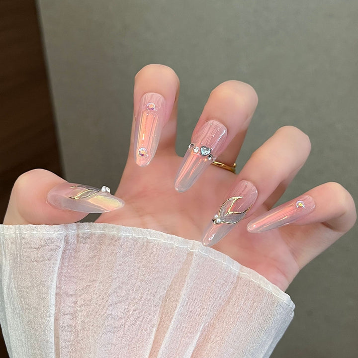 Artistic Stiletto Press-On Nail Art with Glimmering Accents Stornfield