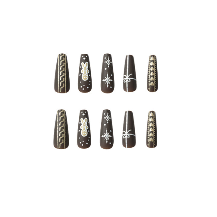 Artificial nail art with festive gingerbread design Stornfield