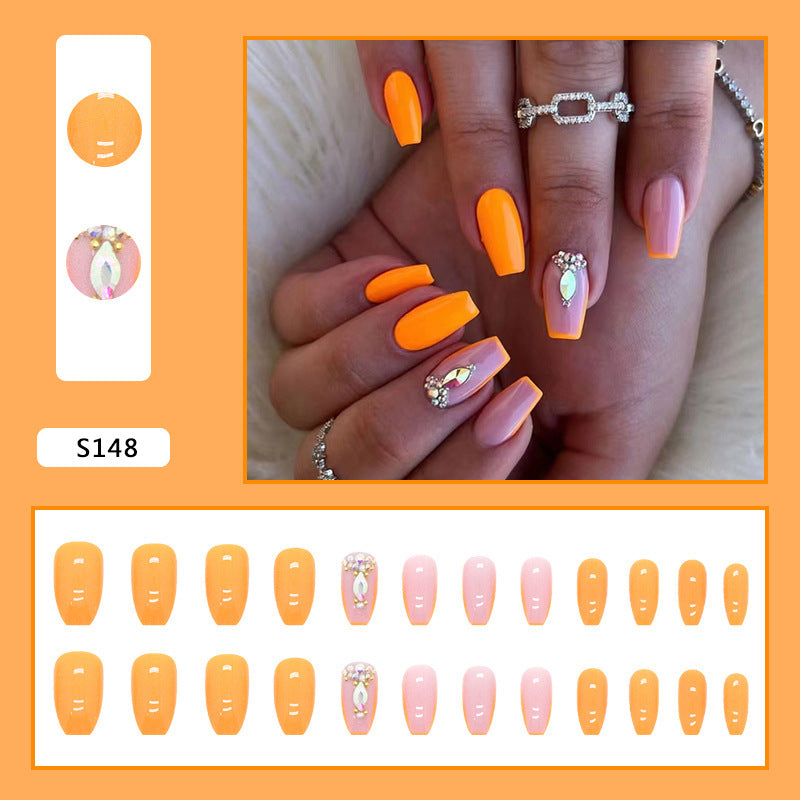 Acrylic nail set with trendy neon colors and rhinestone accents Stornfield
