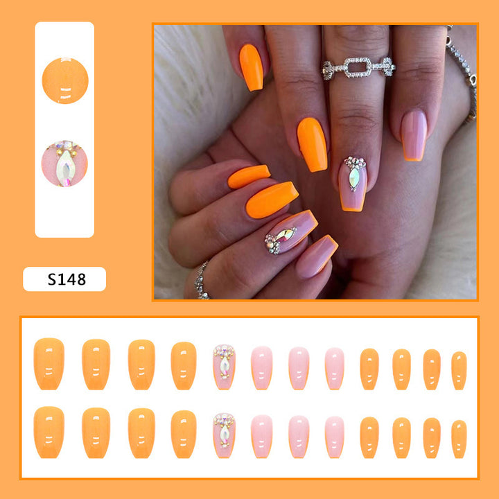 Acrylic nail set with trendy neon colors and rhinestone accents Stornfield
