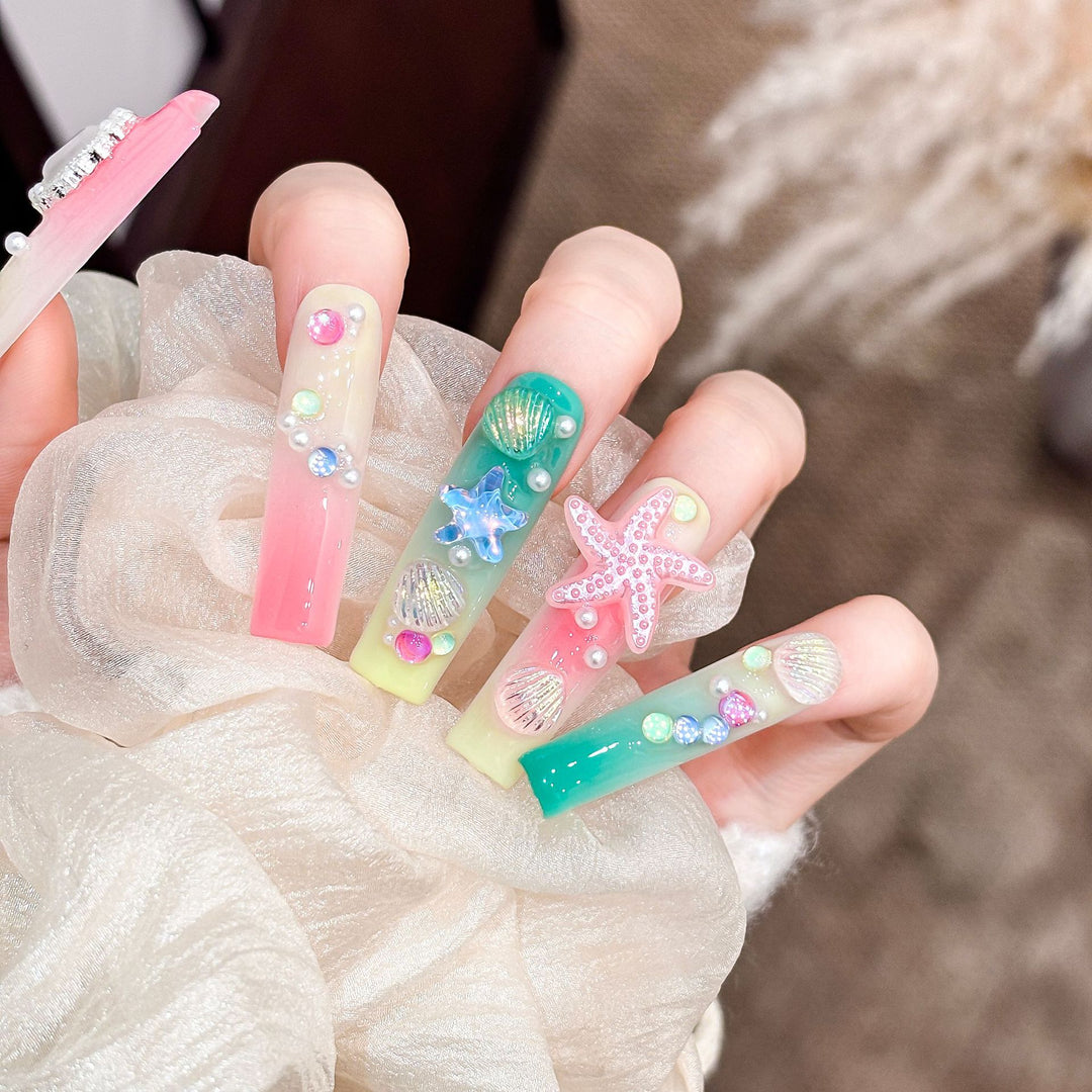 Artistic Long Press-On Nail Set with Ocean-Themed Design