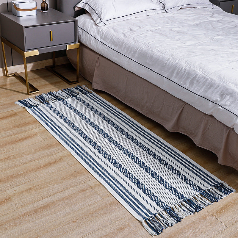 Flat-woven cotton runner with fringes and graphic ethnic stripe pattern Stornfield