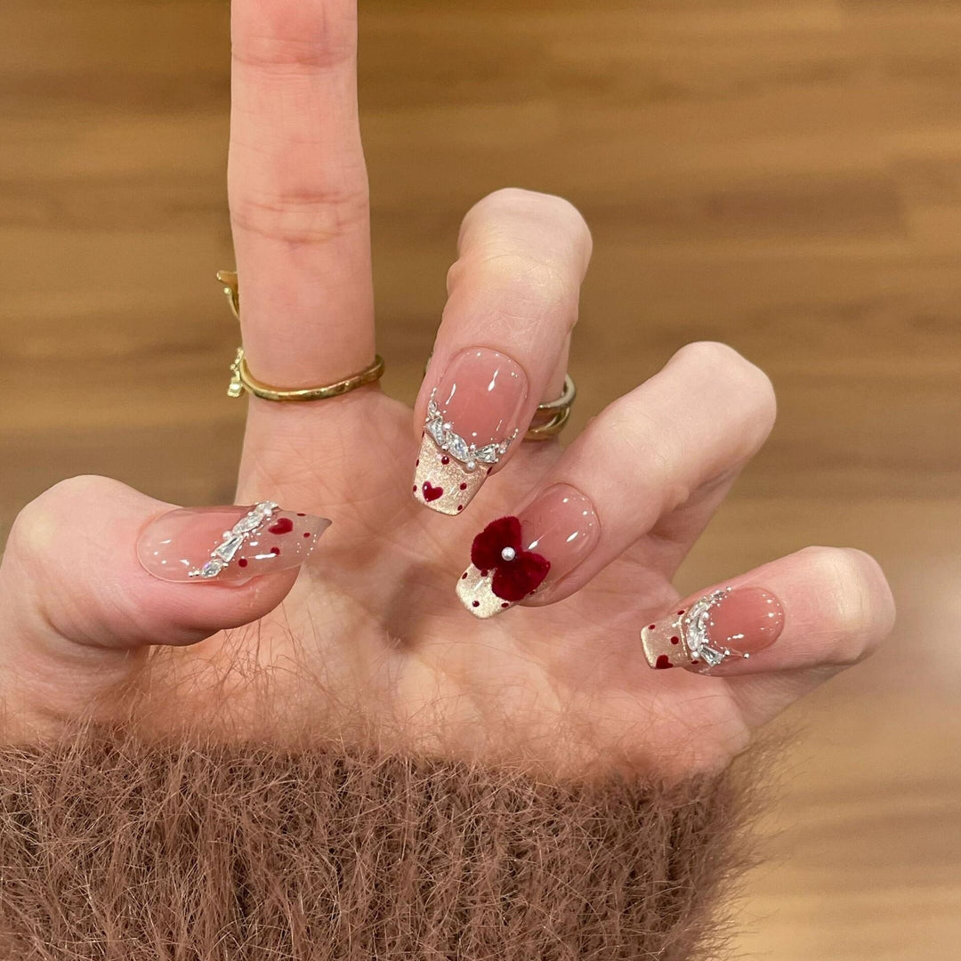 Creative nail art with flower and fruit motifs Stornfield