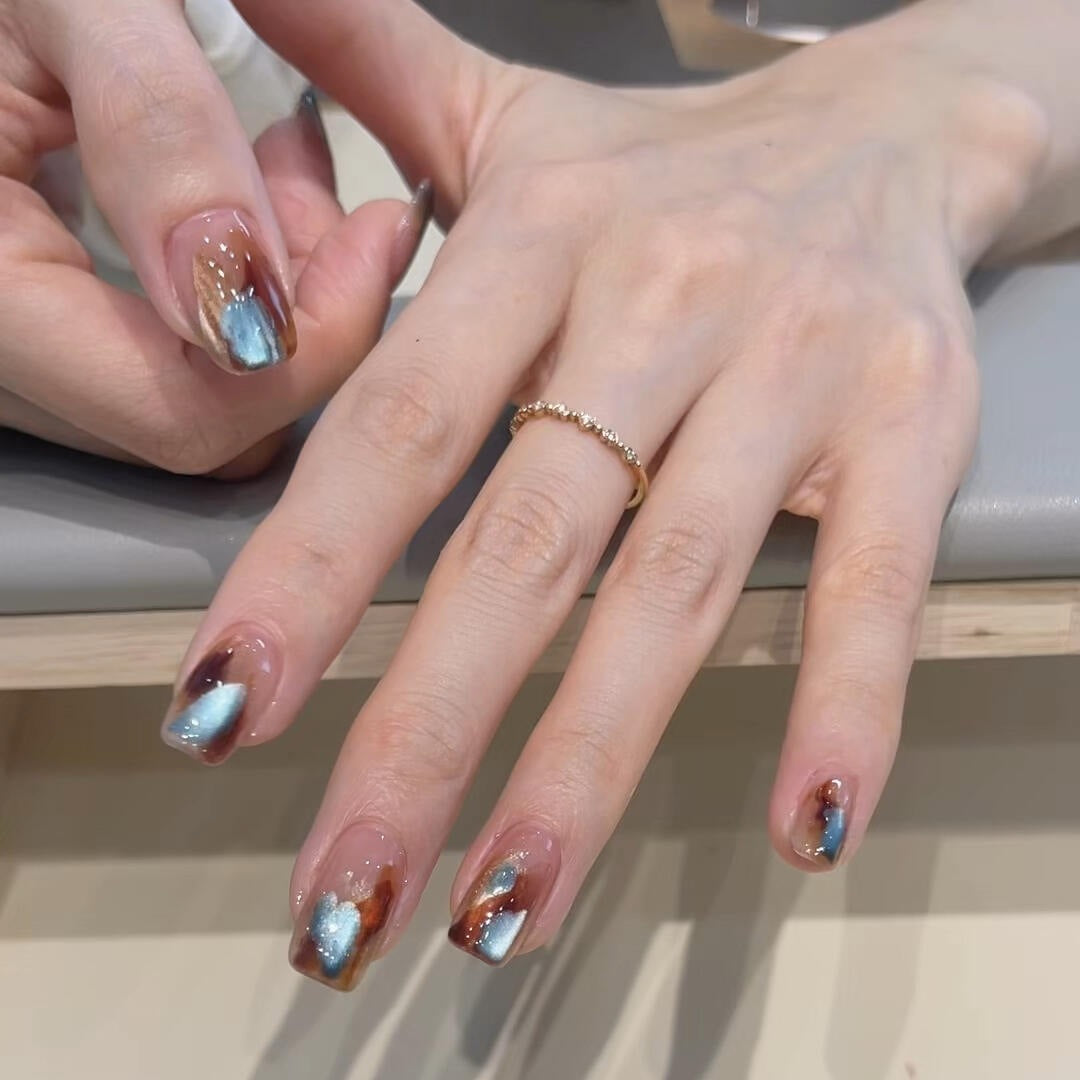Colorful Art Nails In Modern Marbled Design Stornfield