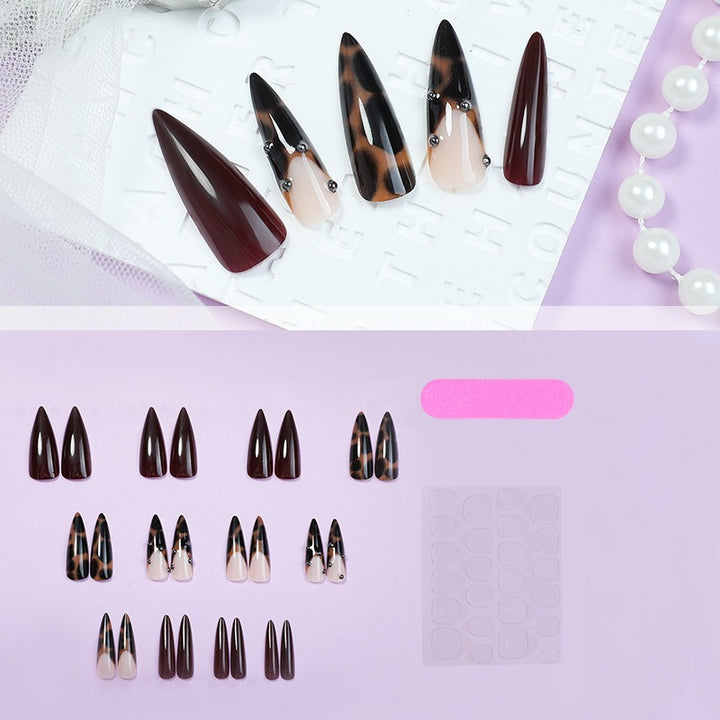 Acrylic nail set with luxurious leopard and elegant accents Stornfield