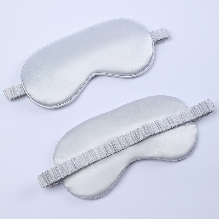 Women's nano silk sleep mask with padded eye area, adjustable elastic band, and storage pouch Stornfield