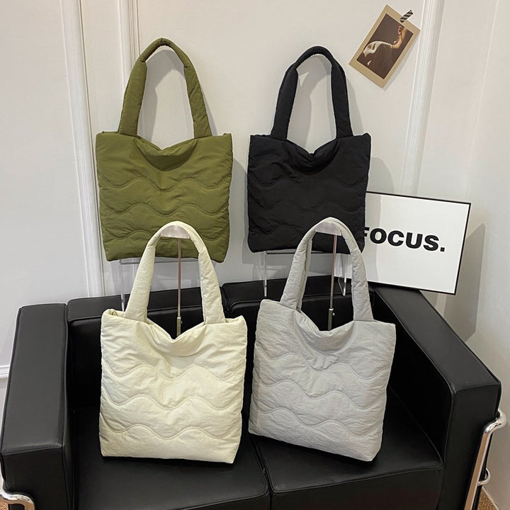 Padded shoulder bag with wave design Stornfield