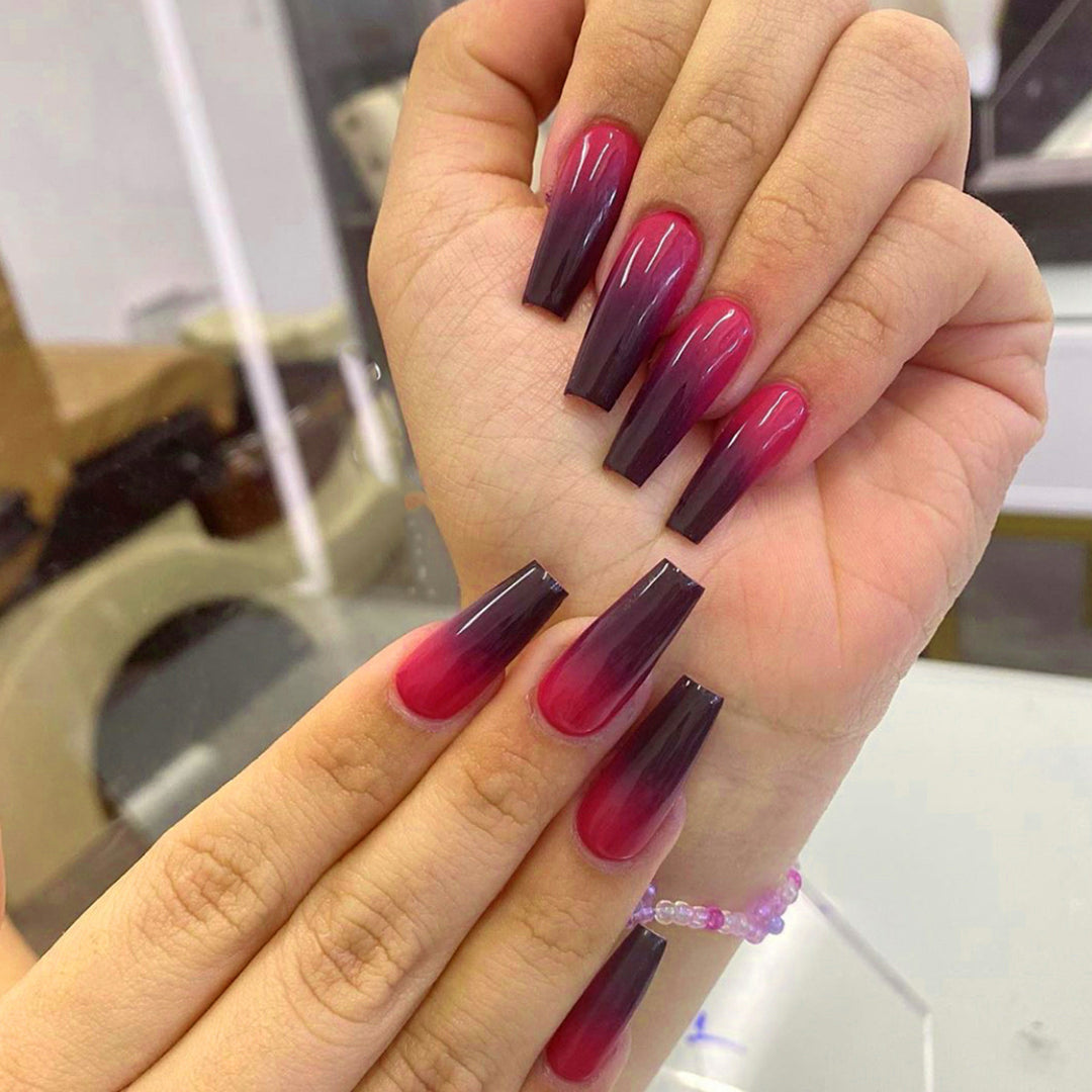 Artificial nail extensions with ombre effect Stornfield