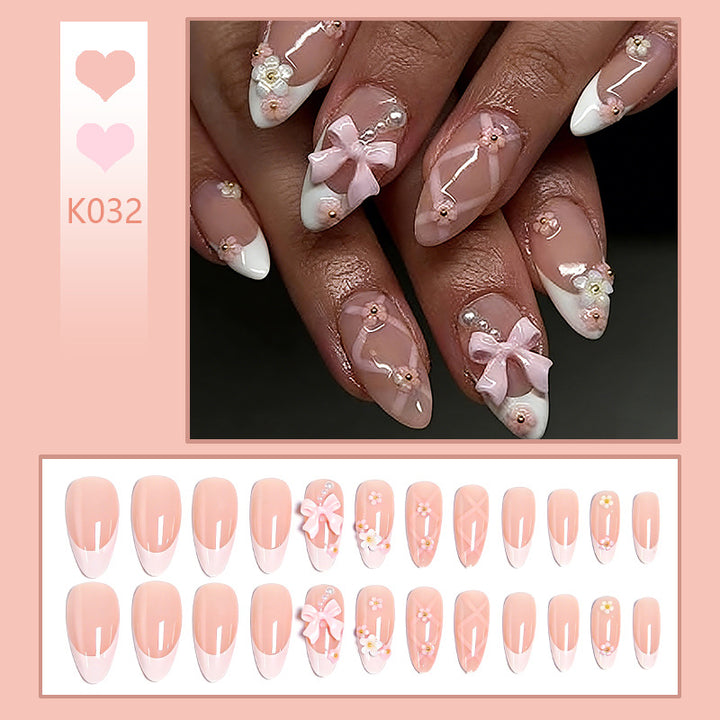 Artful Nail Tips with Ribbons and Floral Decorations Stornfield