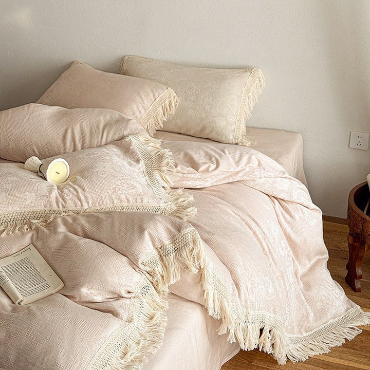 High-quality jacquard bed linen set with decorative fringed trim made of cotton satin