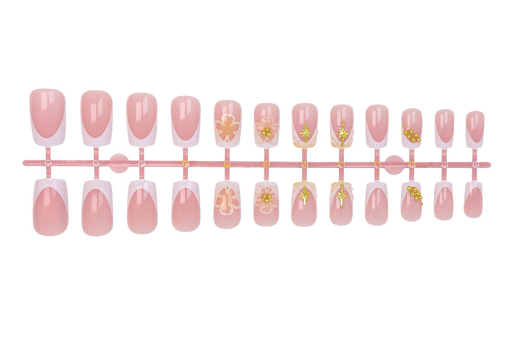 Nail set with delicate flower and gold embellishments Stornfield