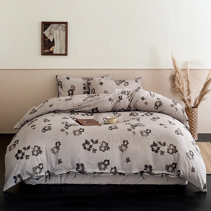 Finely woven cotton bedding set with delicate floral print and decorative ties