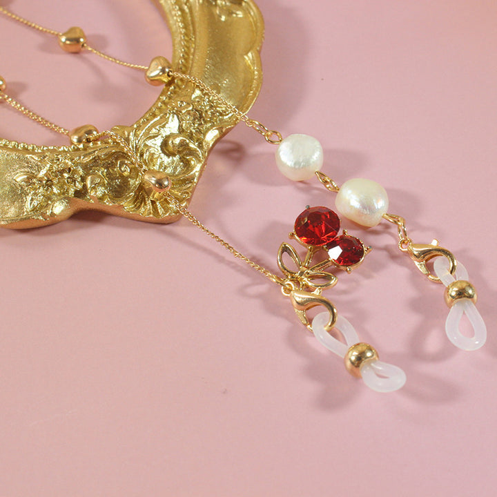 Elegant jewelry ribbon with pearls and silver accents Stornfield