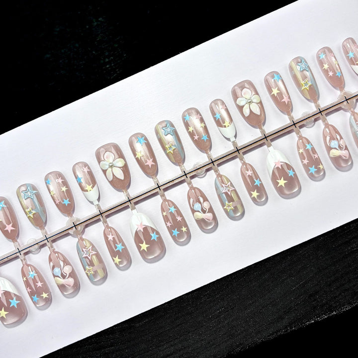 Artistic Press-On Nail Set with Star and Flower Designs