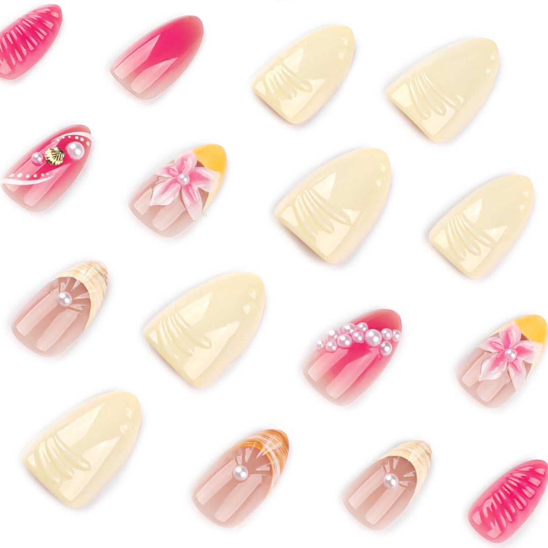 Artful nail extensions with floral and pearl-embellished accents Stornfield