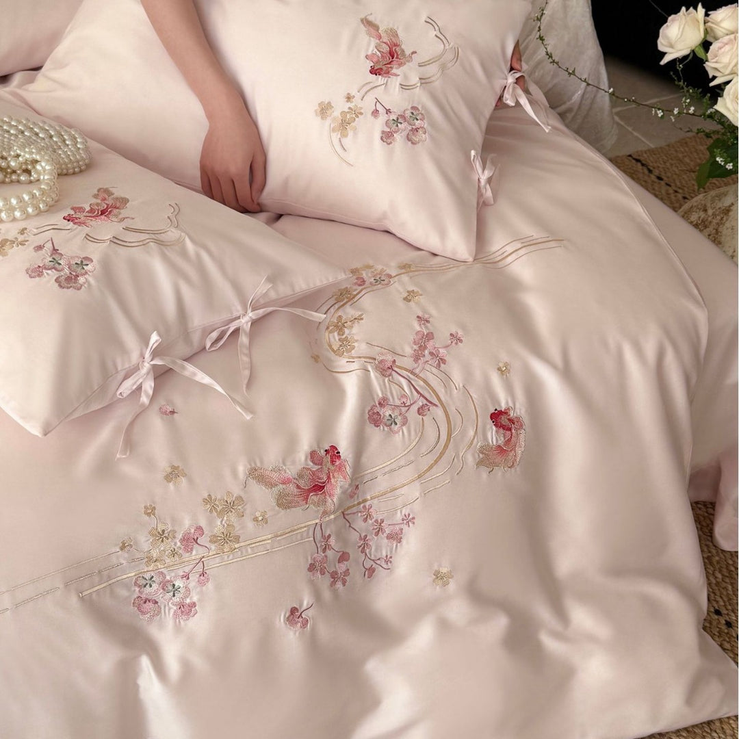 Embroidered satin bedding set with ribbon ties and delicate floral embroidery Stornfield