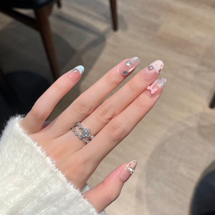 Decorative Press-On Nail Art with Bow and Gem Accents Stornfield