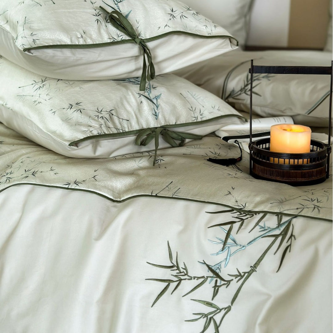 High-quality cotton satin bedding with subtle bamboo motif and piping