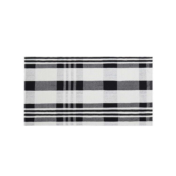 Woven cotton blend bath mat in buffalo check with flat weave structure Stornfield