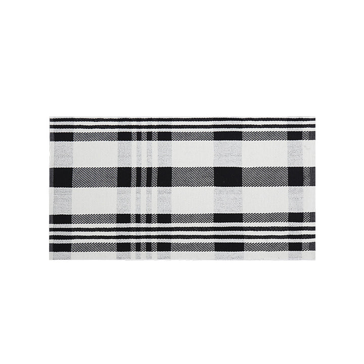 Woven cotton blend bath mat in buffalo check with flat weave structure Stornfield