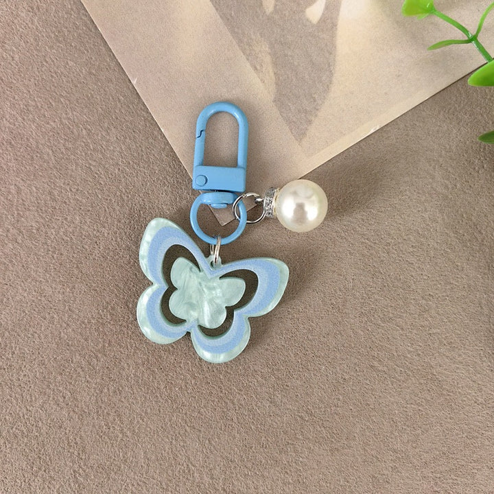 Keychain with butterfly and pearl accent Stornfield