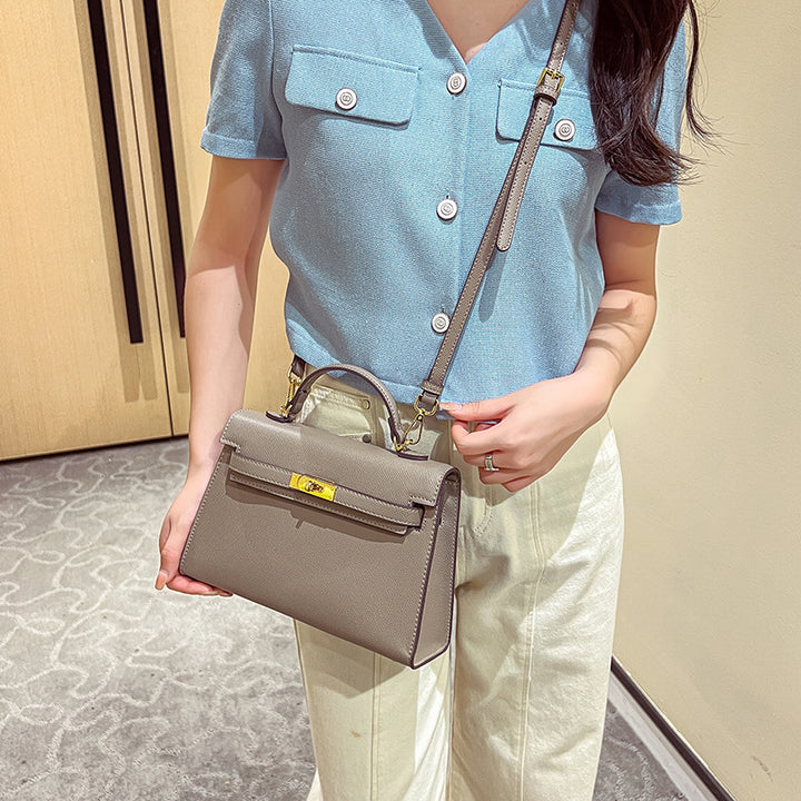 Vintage-Inspired Structured Handbag  1791995440