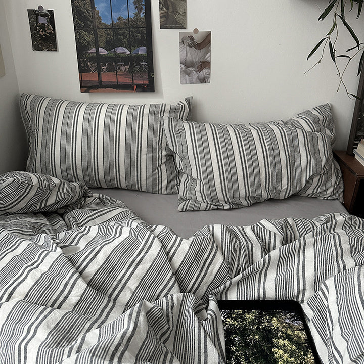 Reversible cotton-linen duvet cover set with natural texture, fine striped structure, and breathable, easy-care quality