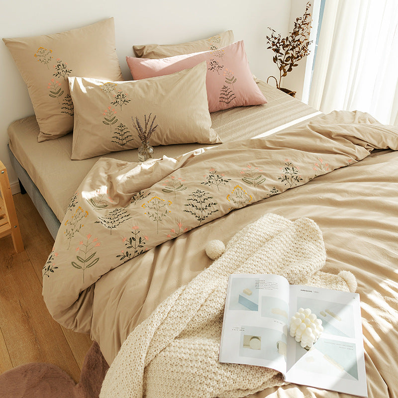 Embroidered cotton muslin bedding set with delicate flower appliqués and extra soft fitted sheet