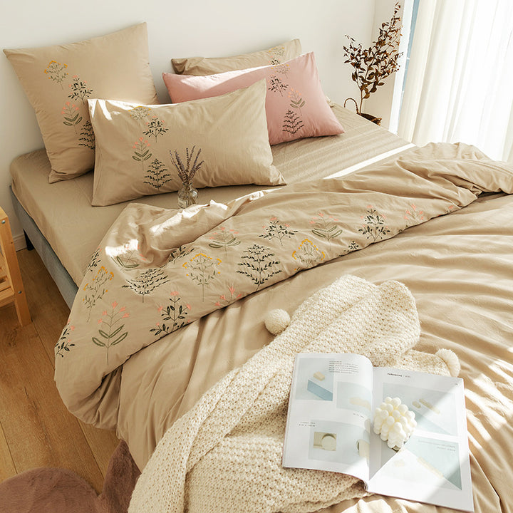 Embroidered cotton muslin bedding set with delicate flower appliqués and extra soft fitted sheet