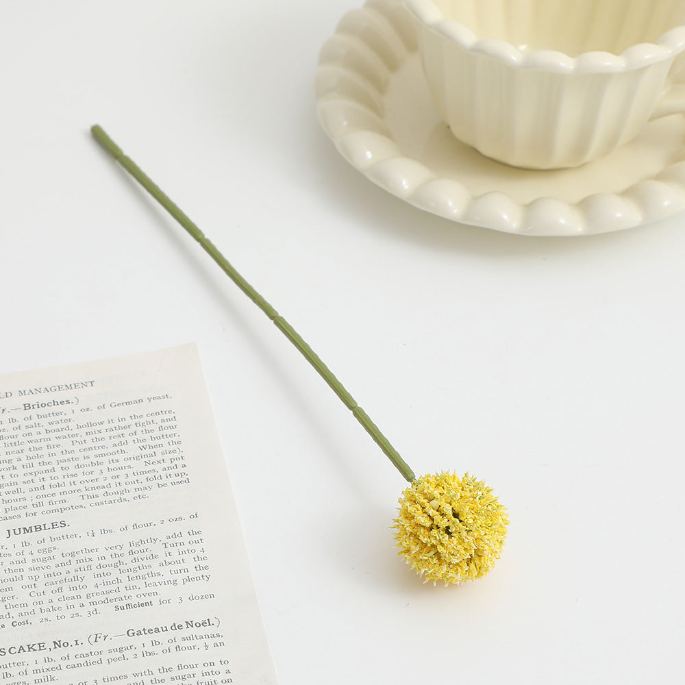 Artificial flower stem with detailed blooms