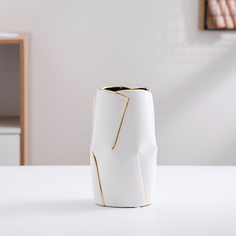 Decorative ceramic vase with golden accents Stornfield