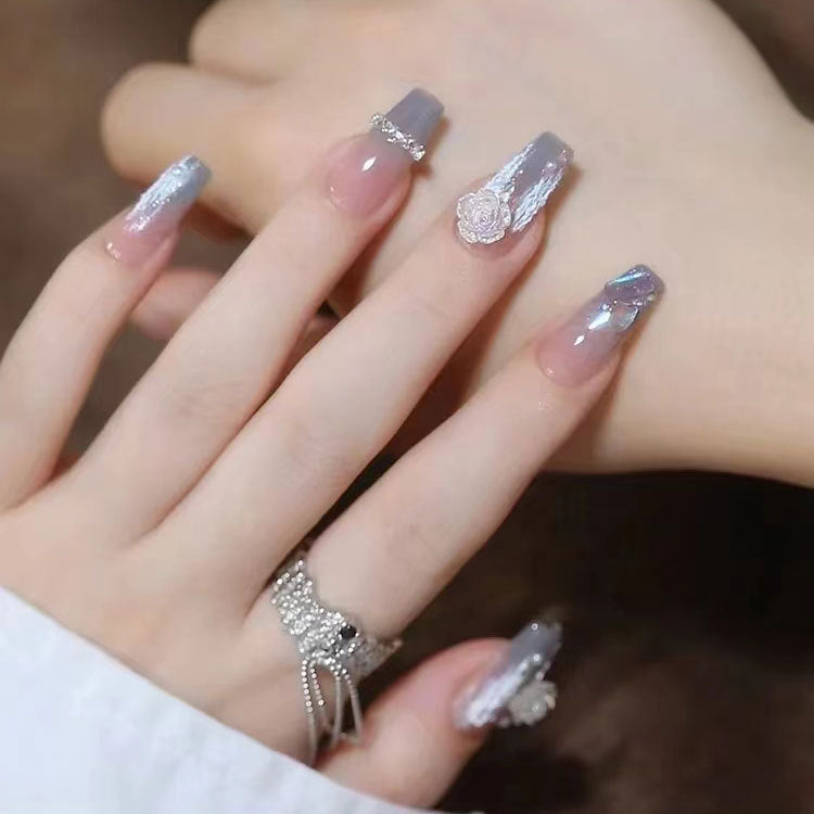 Nails with 3D flowers and glitter Stornfield