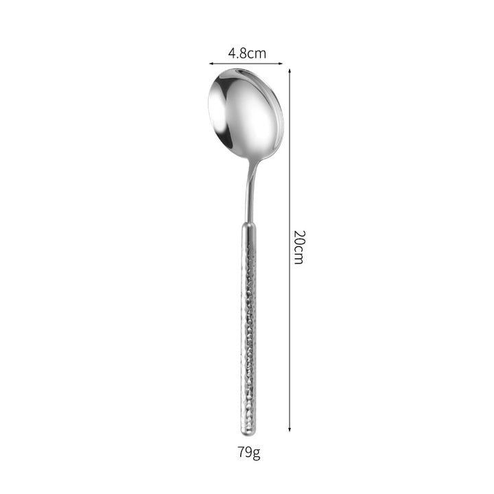 Elegant dessert spoon with elaborate handle design Stornfield