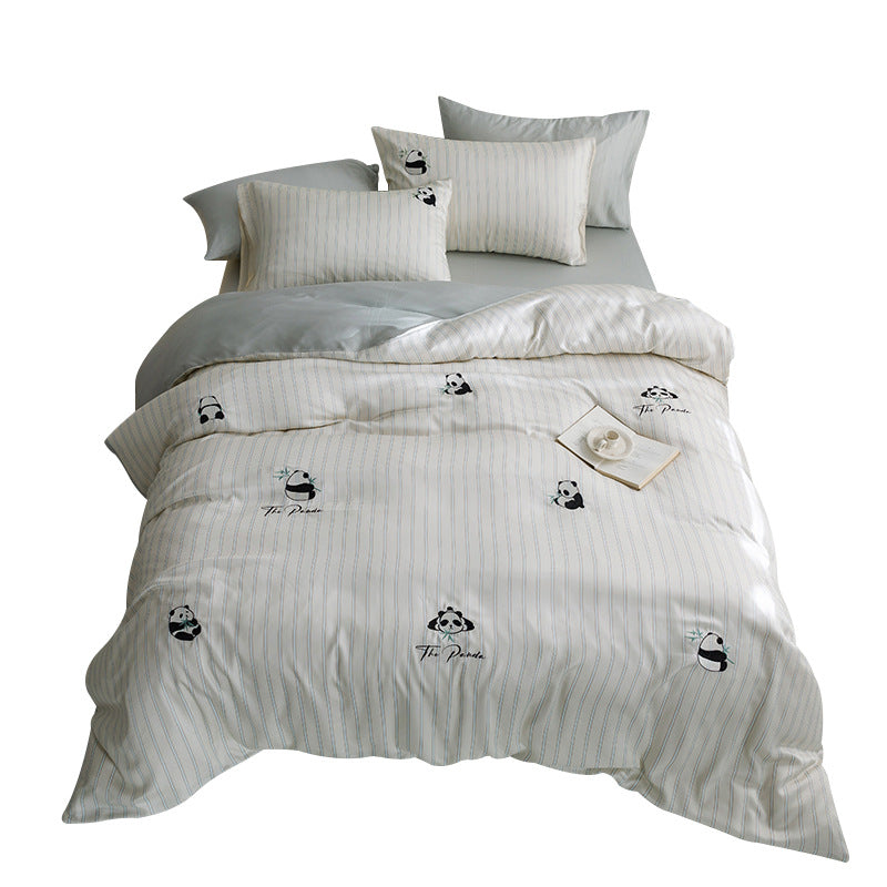 Quilted bed set with panda embroidery and fine stripe texture