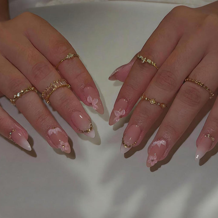 Artificial nail set with romantic flower and glitter accents Stornfield
