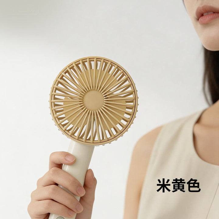 Women's portable handheld fan with ergonomic grip and powerful battery technology Stornfield