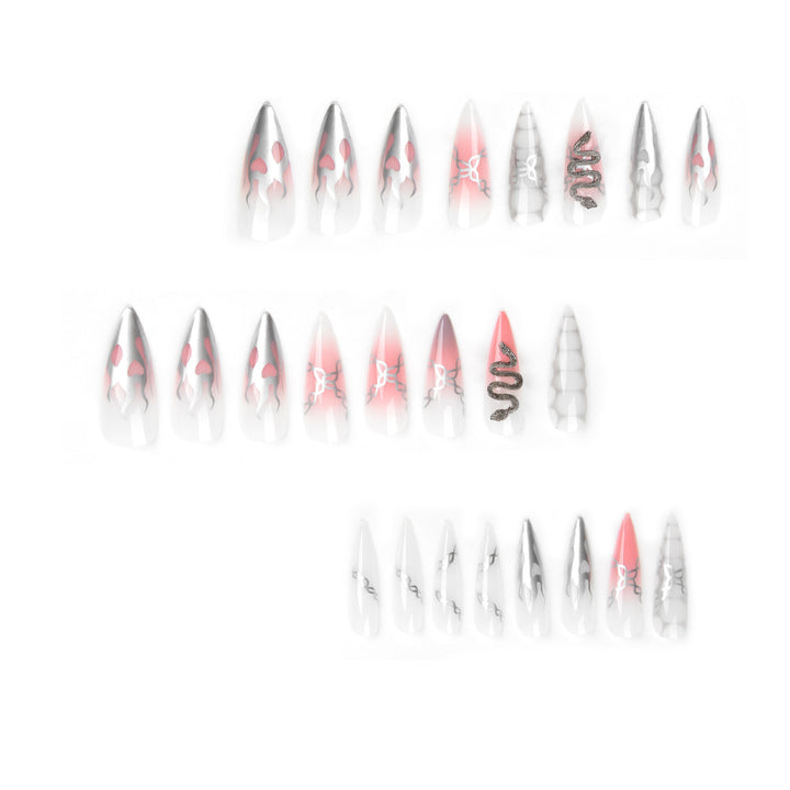 Artistic stiletto nails with snake motif Stornfield